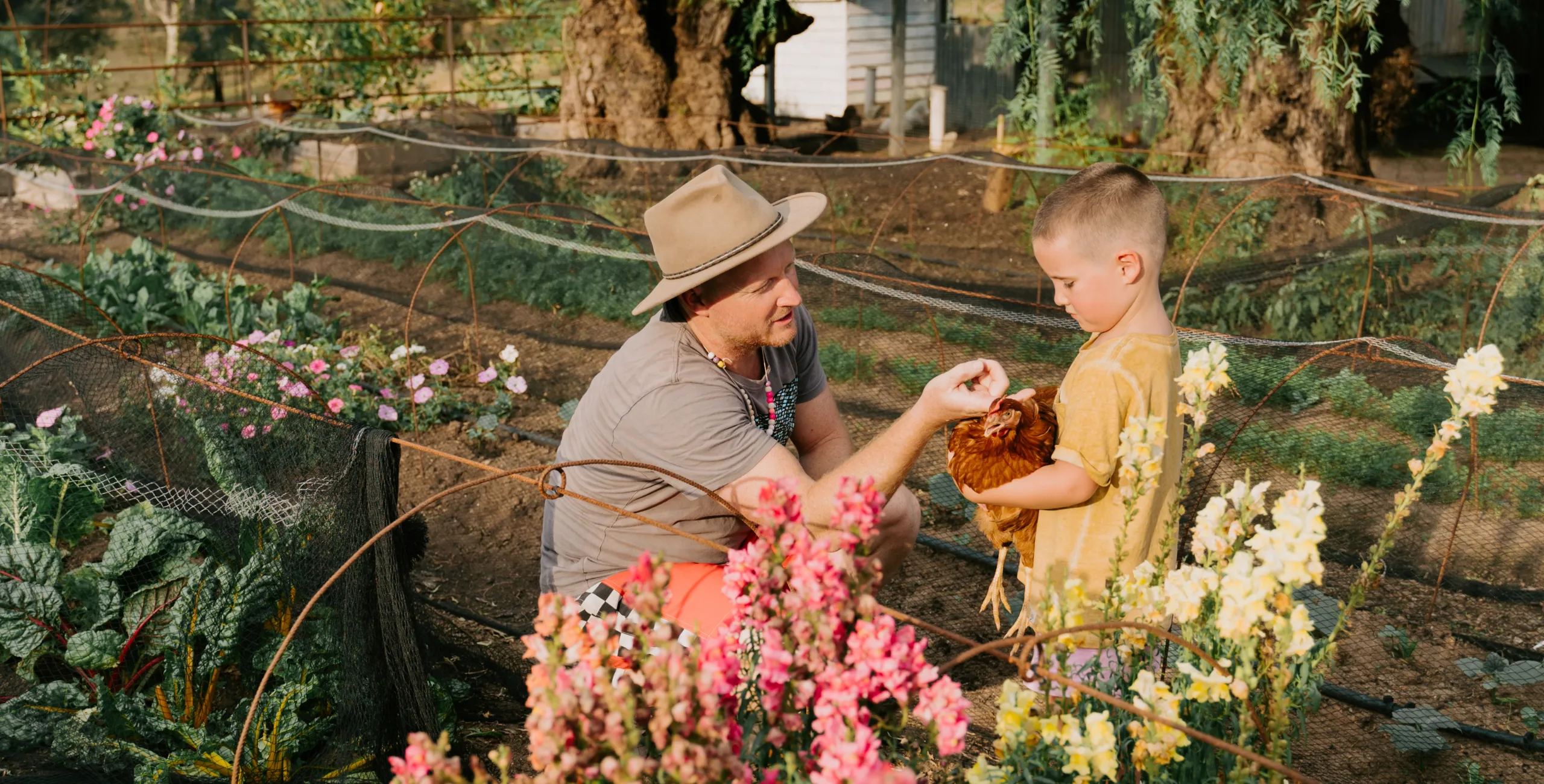 adult and kid in quondong farm